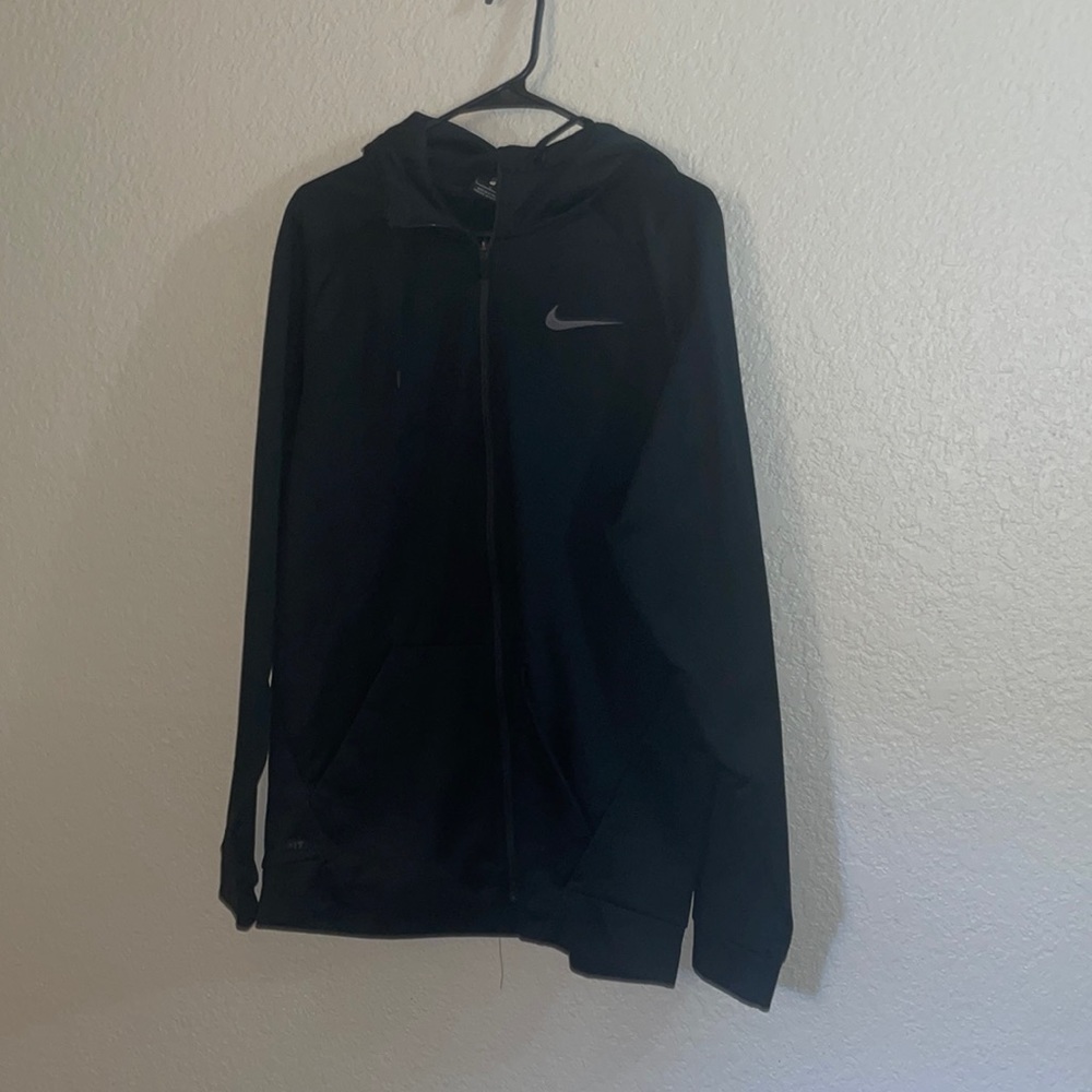Large black Nike zip up
